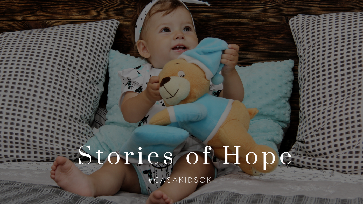 Stories of Hope. Baby Girl. Teddy Bear. Close up. 